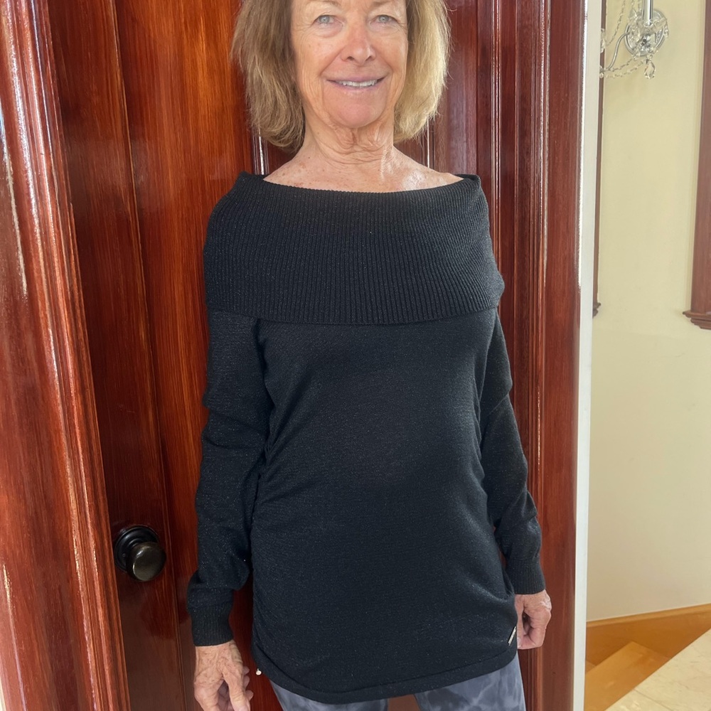 Michael Kors black sparkle light weight sweater with adjustable sides.